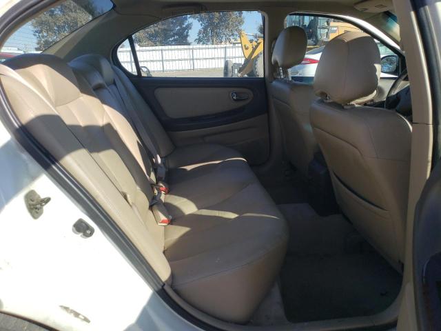 Photo 9 VIN: JN1CA31D1YT721356 - NISSAN MAXIMA GLE 