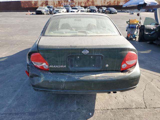 Photo 5 VIN: JN1CA31D1YT734012 - NISSAN MAXIMA GLE 