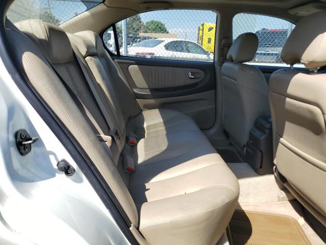 Photo 9 VIN: JN1CA31D2YT725979 - NISSAN MAXIMA GLE 