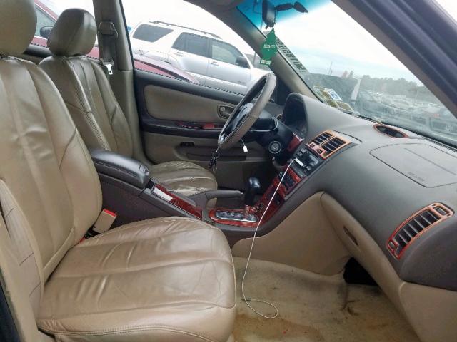 Photo 4 VIN: JN1CA31D3YT720743 - NISSAN MAXIMA GLE 