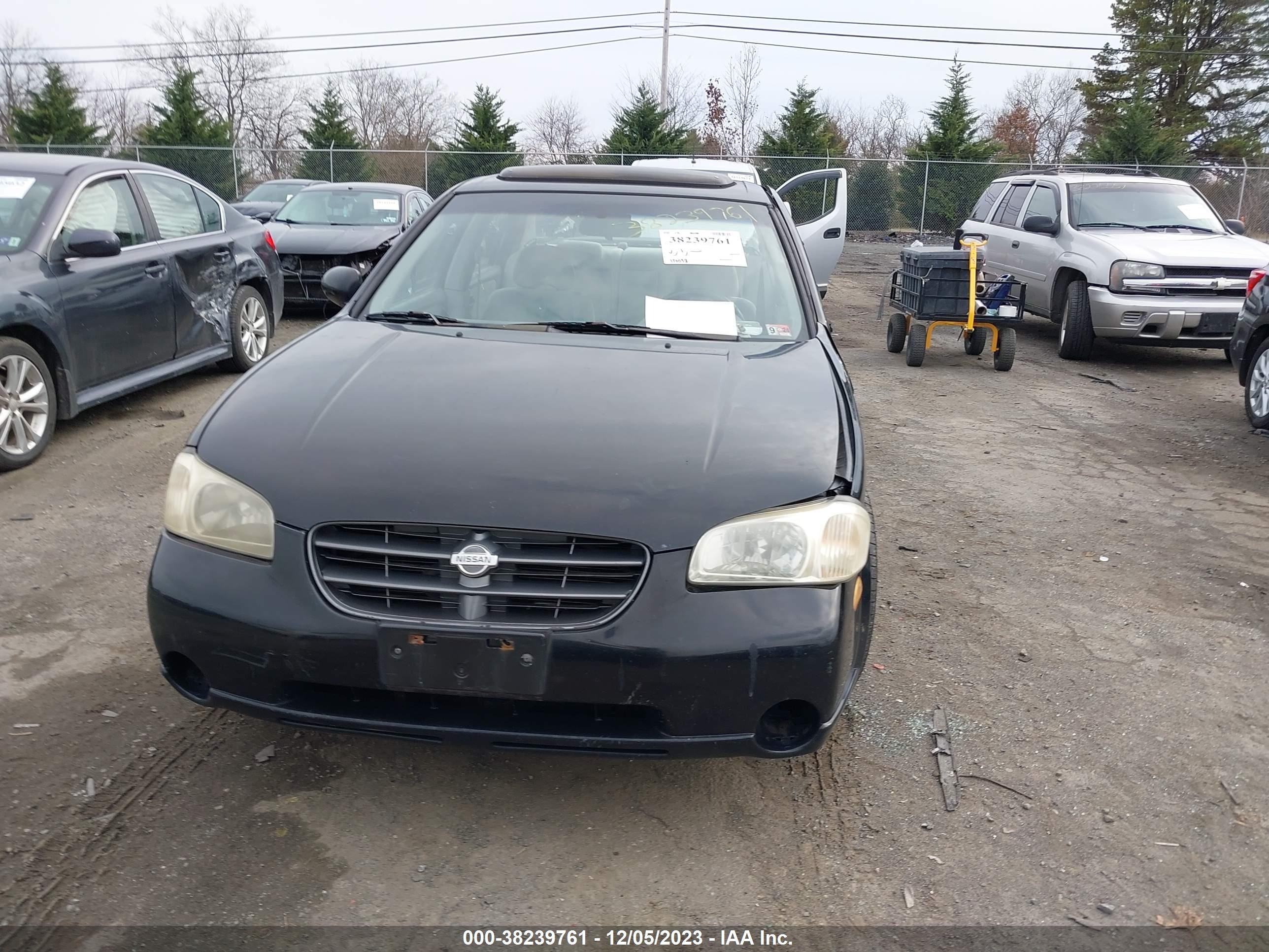 Photo 12 VIN: JN1CA31D4YT709864 - NISSAN MAXIMA 