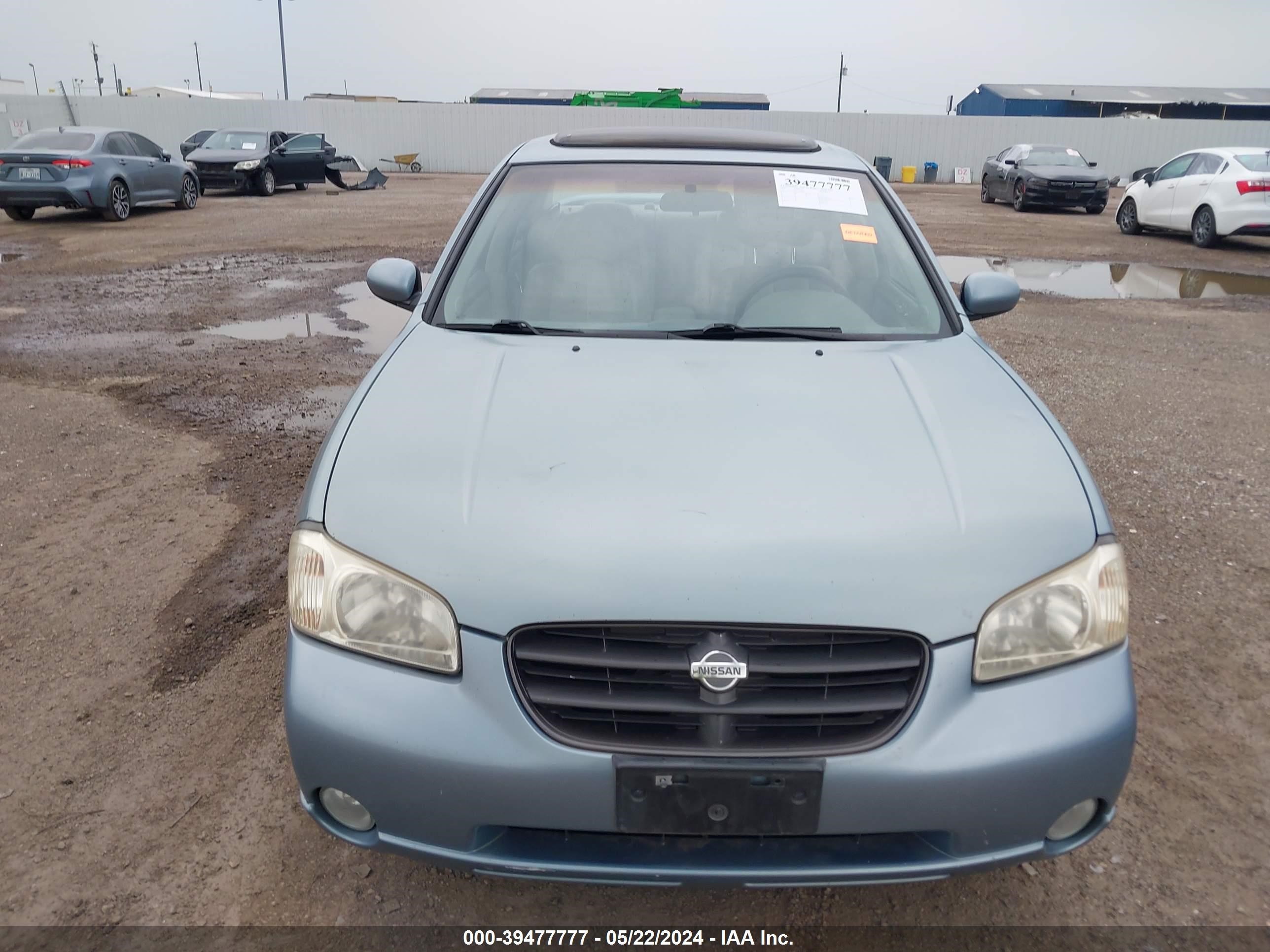 Photo 5 VIN: JN1CA31D8YT528783 - NISSAN MAXIMA 