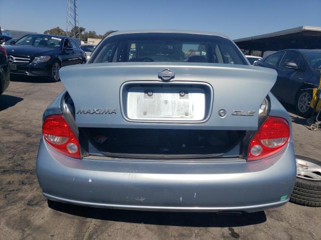 Photo 5 VIN: JN1CA31D9YT543874 - NISSAN MAXIMA GLE 