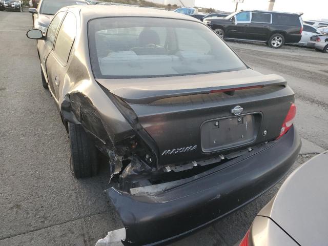 Photo 5 VIN: JN1CA31D9YT547567 - NISSAN MAXIMA 