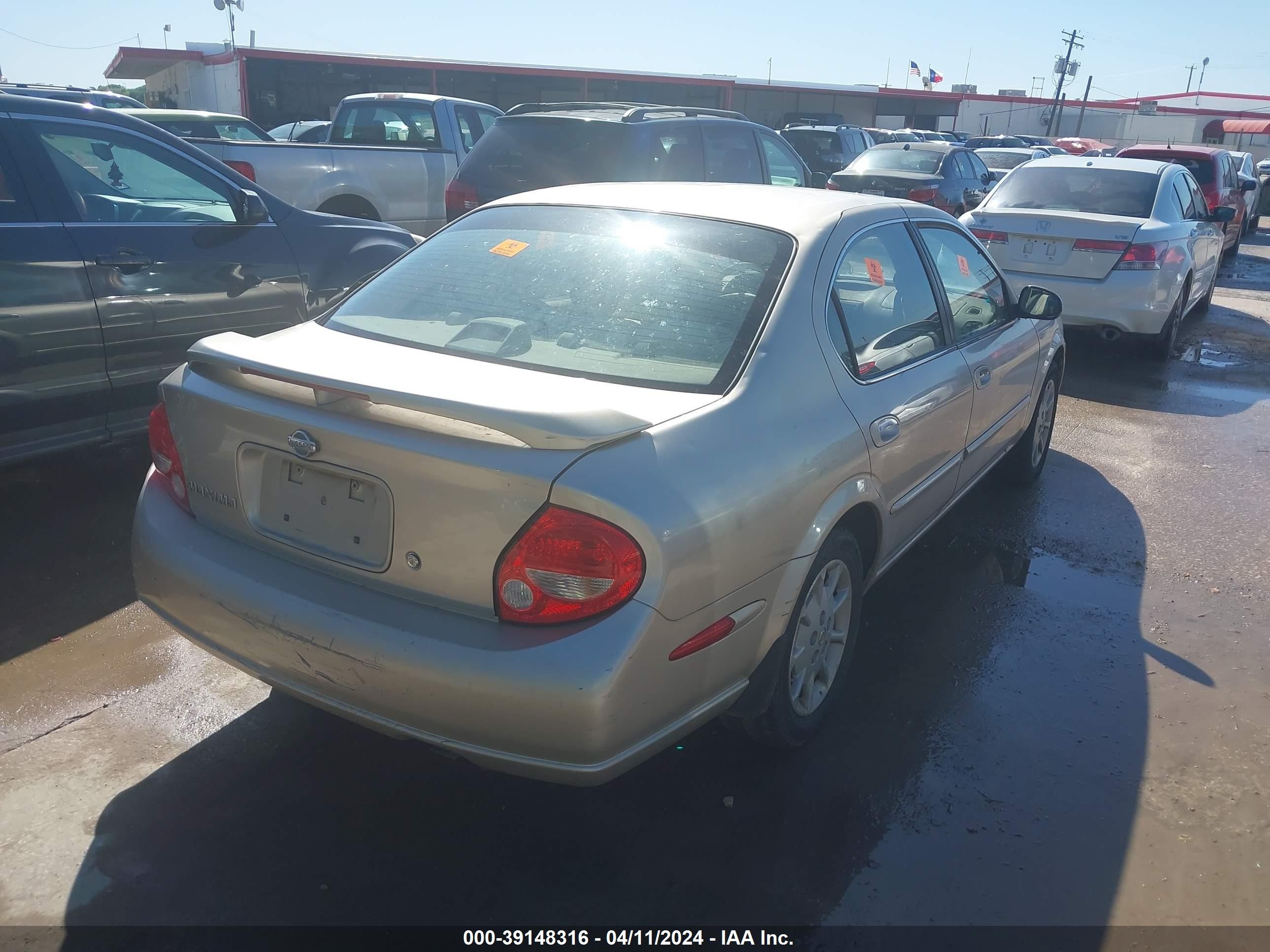 Photo 3 VIN: JN1CA31DXYT713479 - NISSAN MAXIMA 