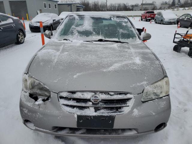 Photo 4 VIN: JN1CA31DXYT757143 - NISSAN MAXIMA GLE 