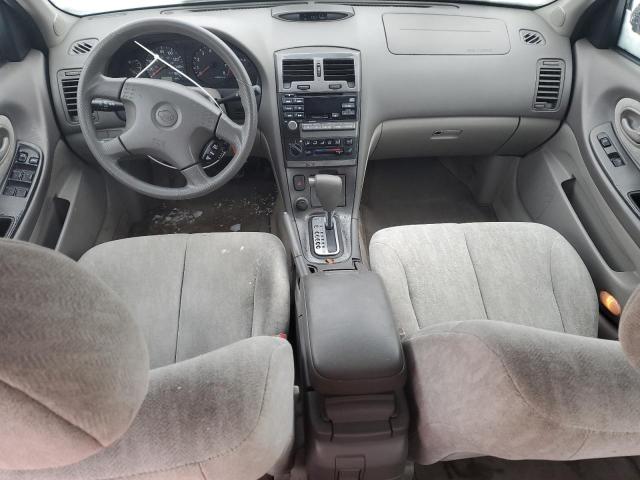 Photo 7 VIN: JN1CA31DXYT757143 - NISSAN MAXIMA GLE 