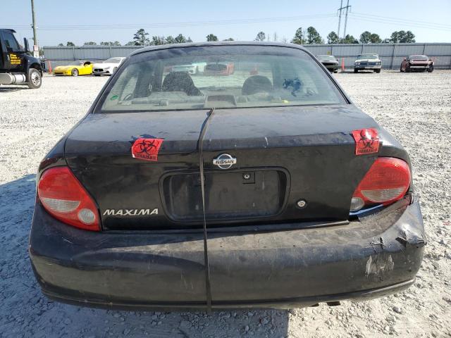 Photo 5 VIN: JN1CA31DXYT763119 - NISSAN MAXIMA GLE 