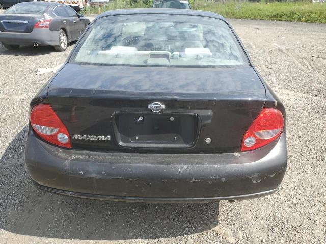 Photo 5 VIN: JN1CA31DXYT764514 - NISSAN MAXIMA GLE 