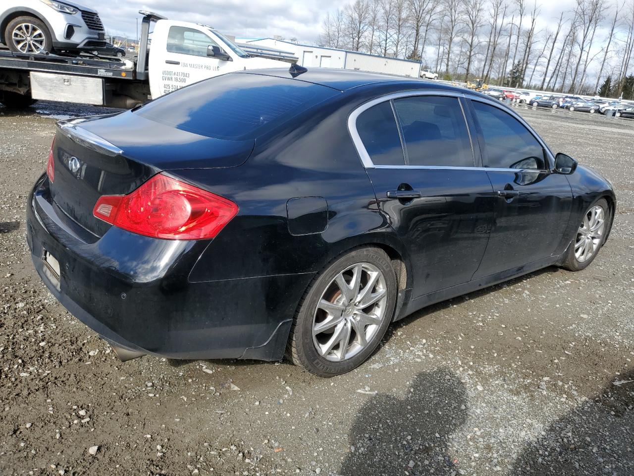 Photo 2 VIN: JN1CV6AR0CM973085 - INFINITI G 