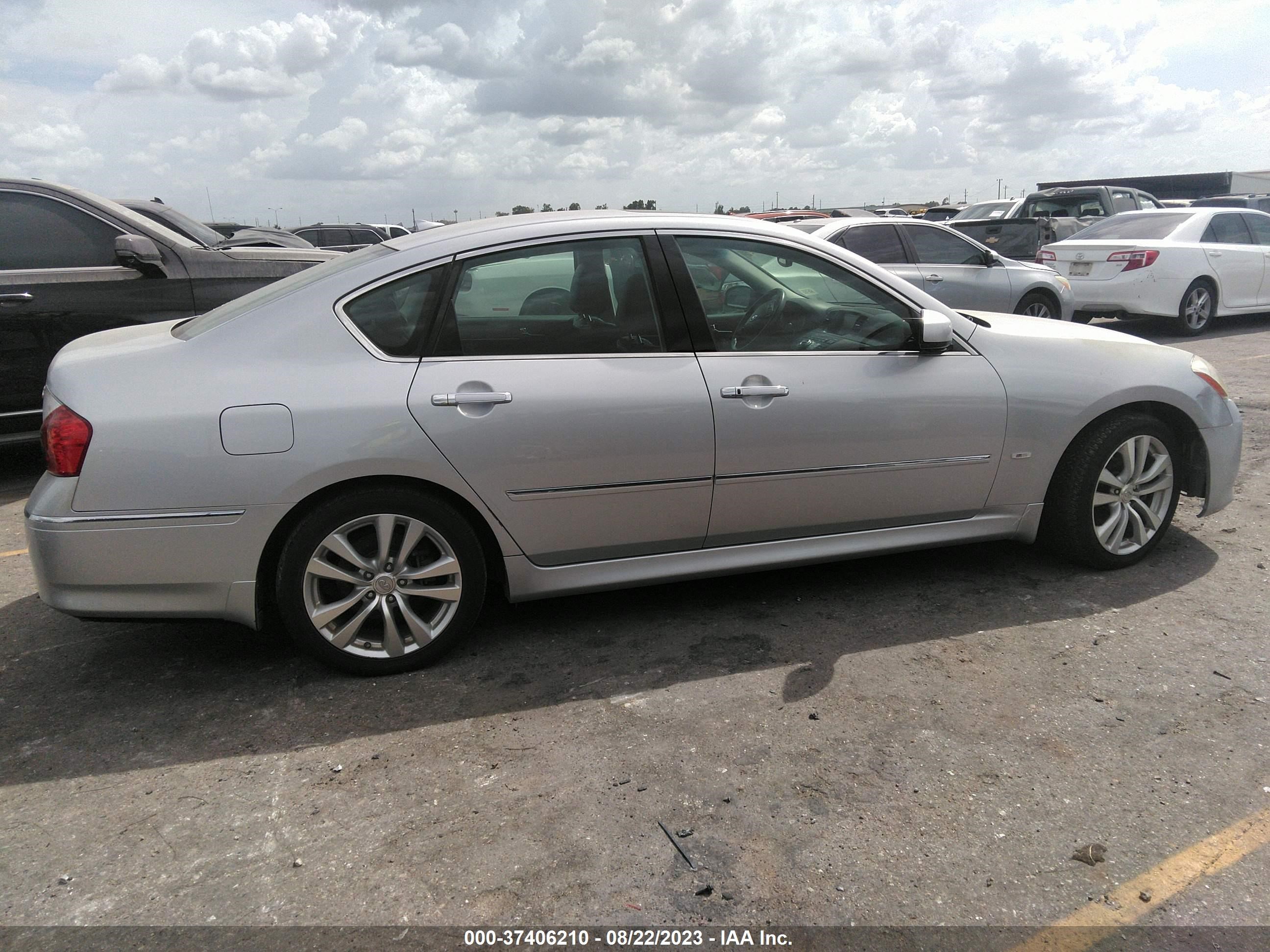 Photo 11 VIN: JN1CY0AP8AM911482 - INFINITI M 