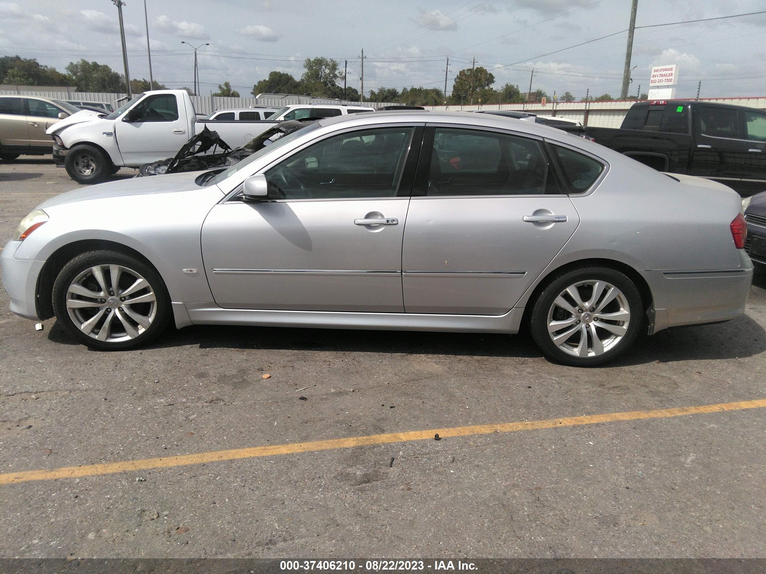 Photo 12 VIN: JN1CY0AP8AM911482 - INFINITI M 