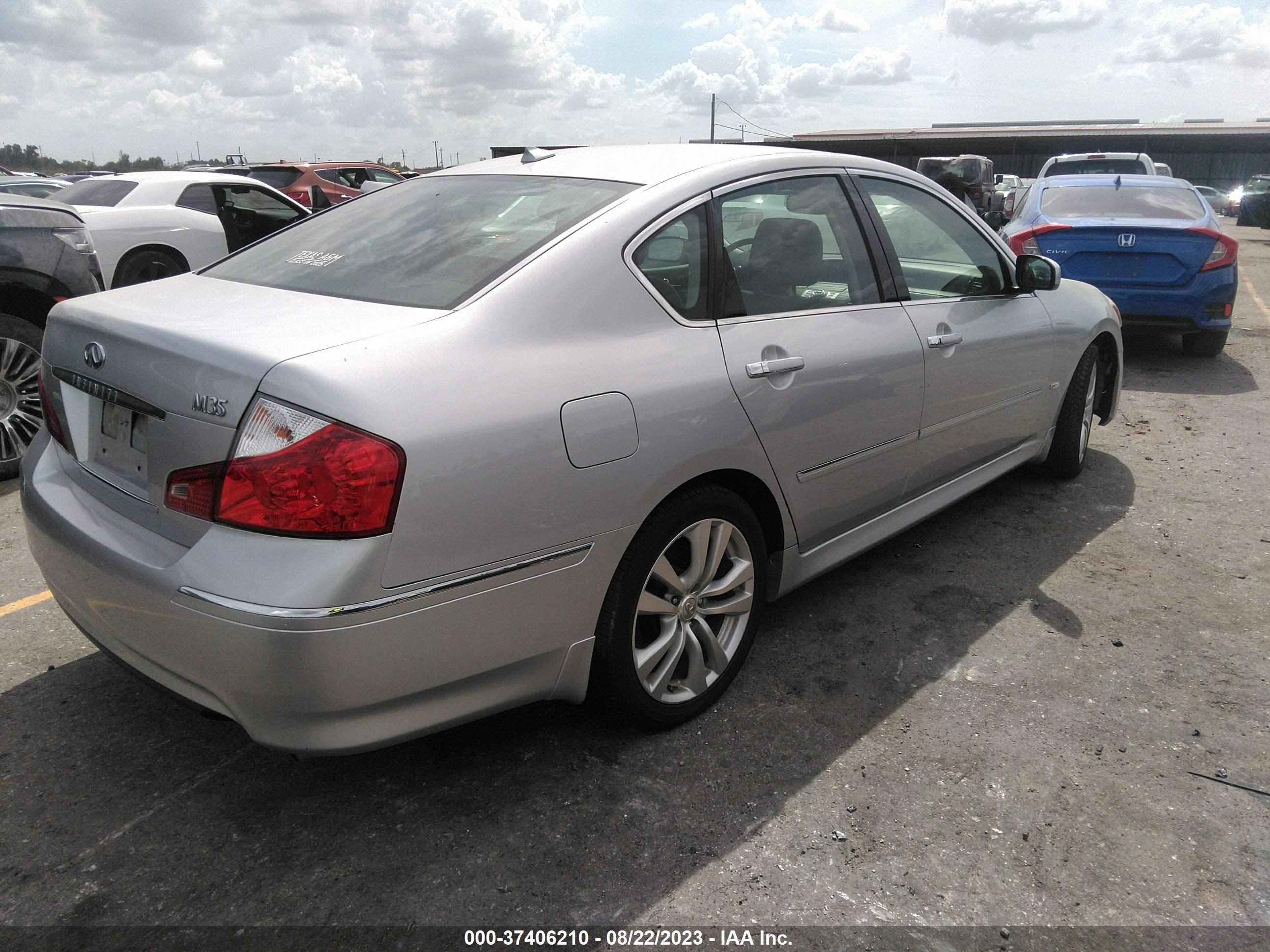 Photo 3 VIN: JN1CY0AP8AM911482 - INFINITI M 