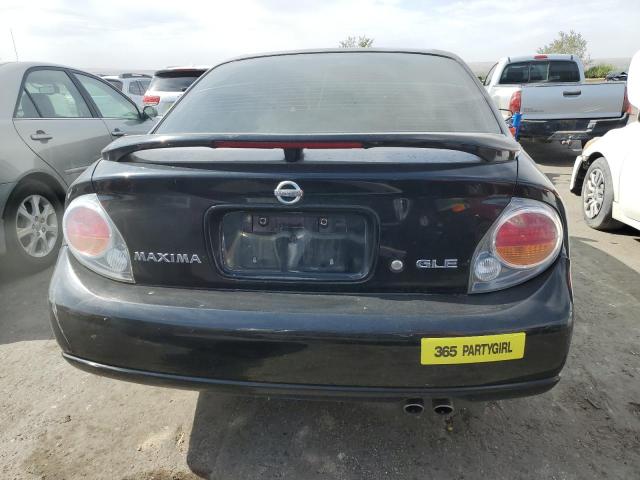 Photo 5 VIN: JN1DA31AX3T419647 - NISSAN MAXIMA GLE 