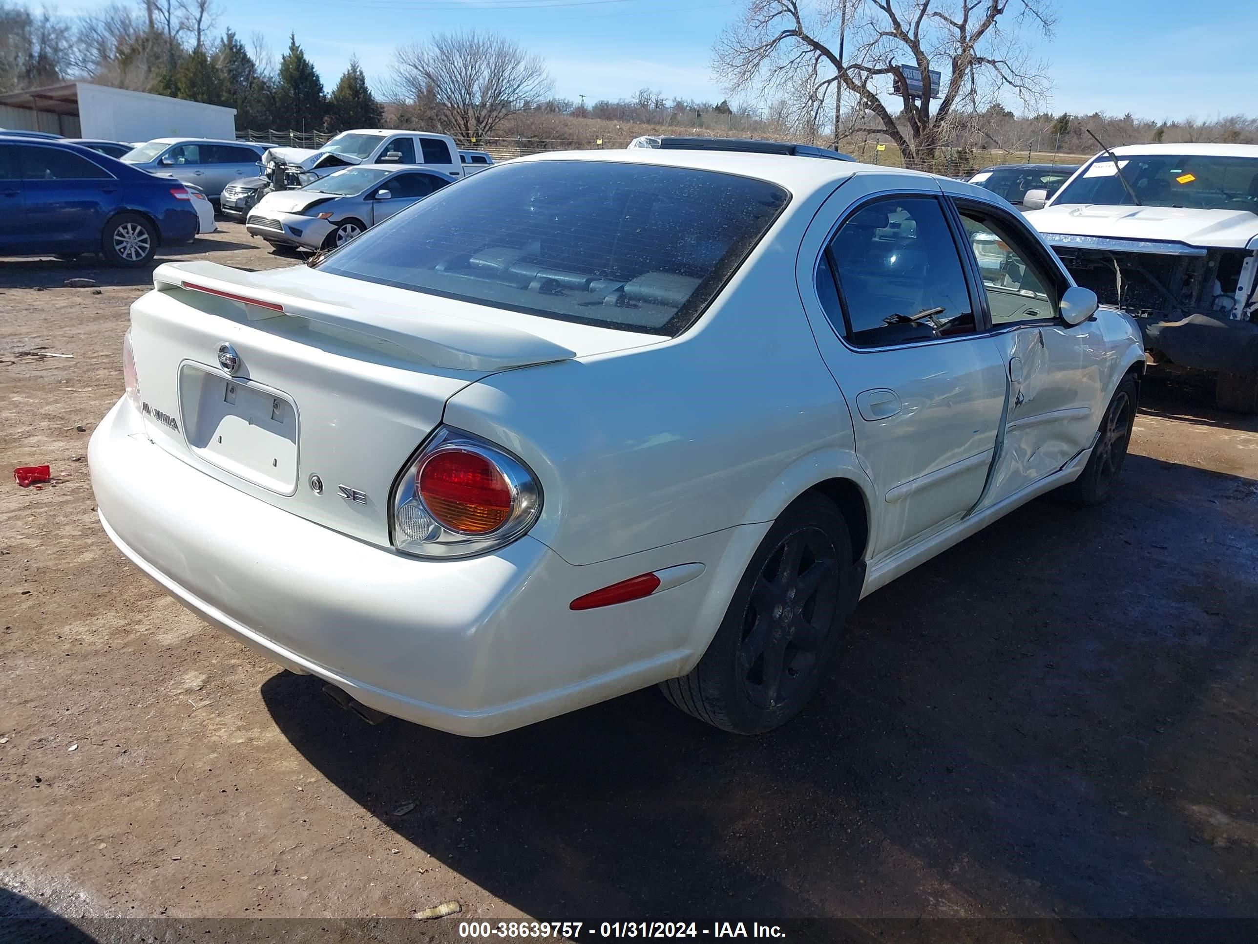 Photo 3 VIN: JN1DA31D52T403090 - NISSAN MAXIMA 