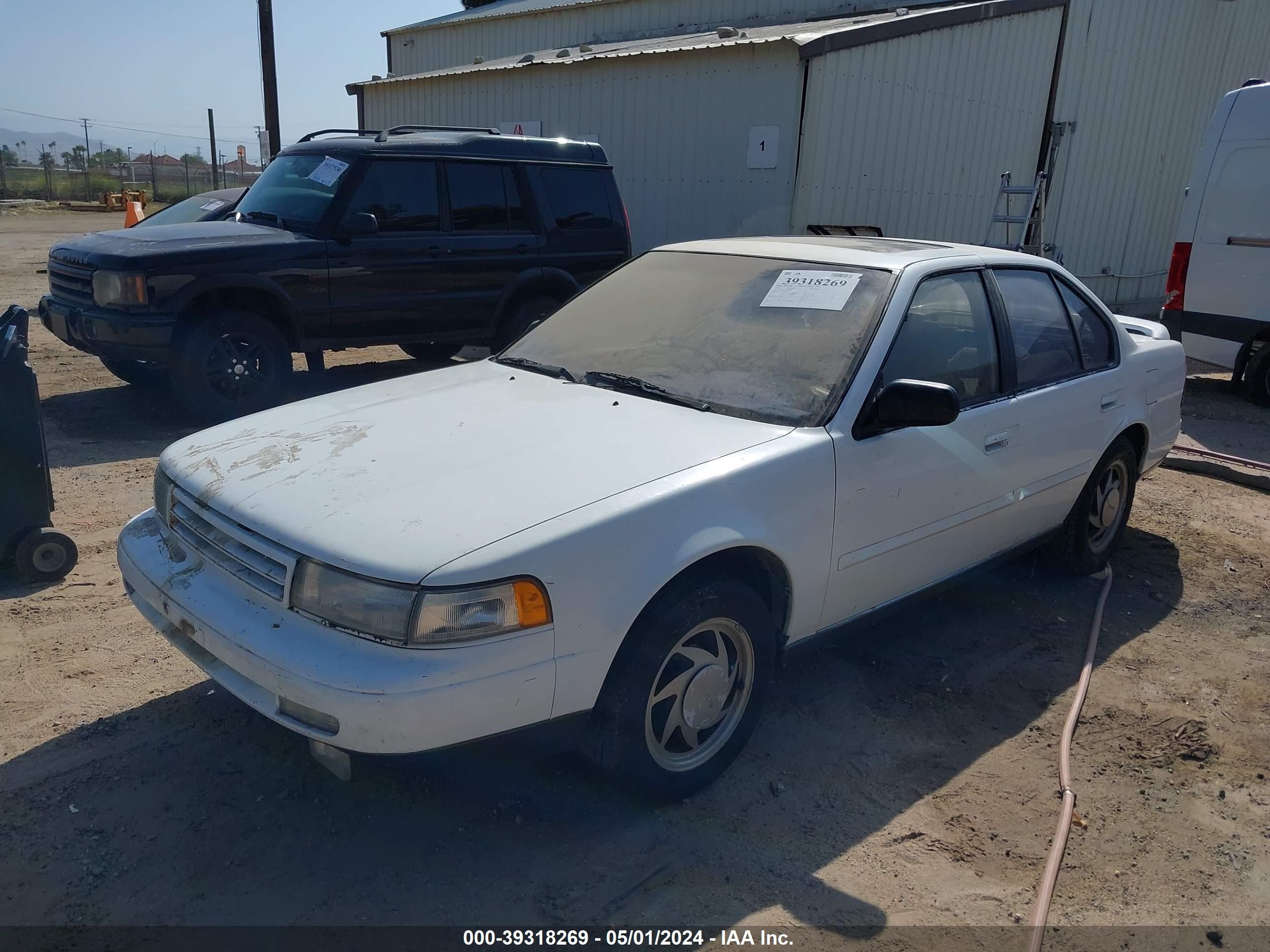 Photo 1 VIN: JN1HJ01P7LT368127 - NISSAN MAXIMA 