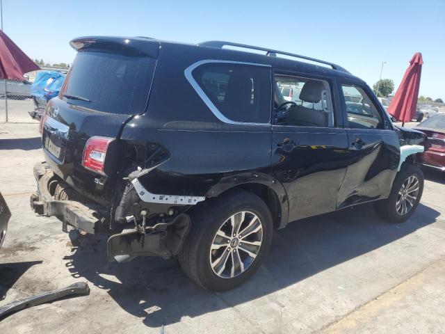 Photo 2 VIN: JN8AY2ND2KX010709 - NISSAN ARMADA SV 