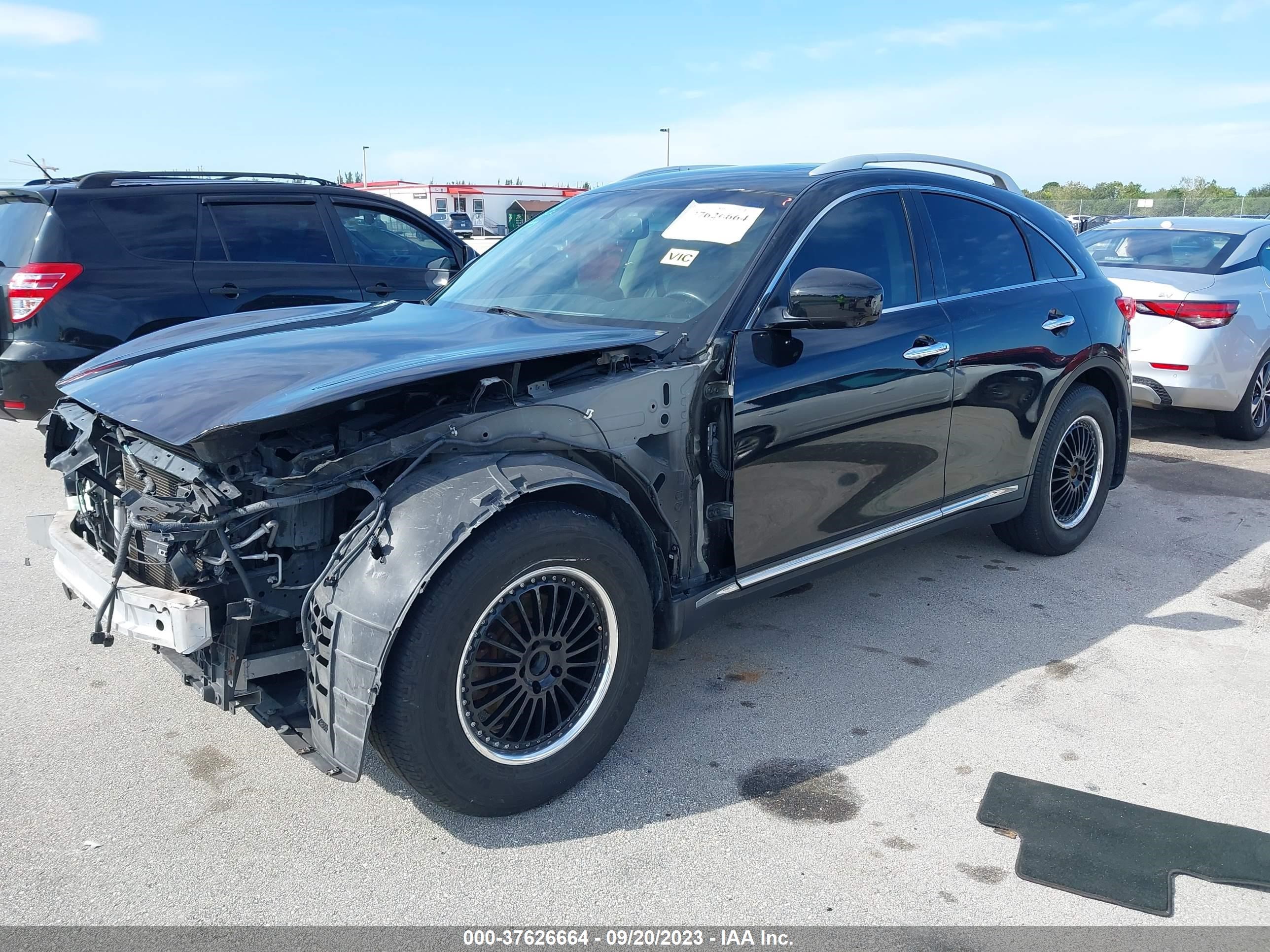 Photo 1 VIN: JN8CS1MU4EM450037 - INFINITI QX70 