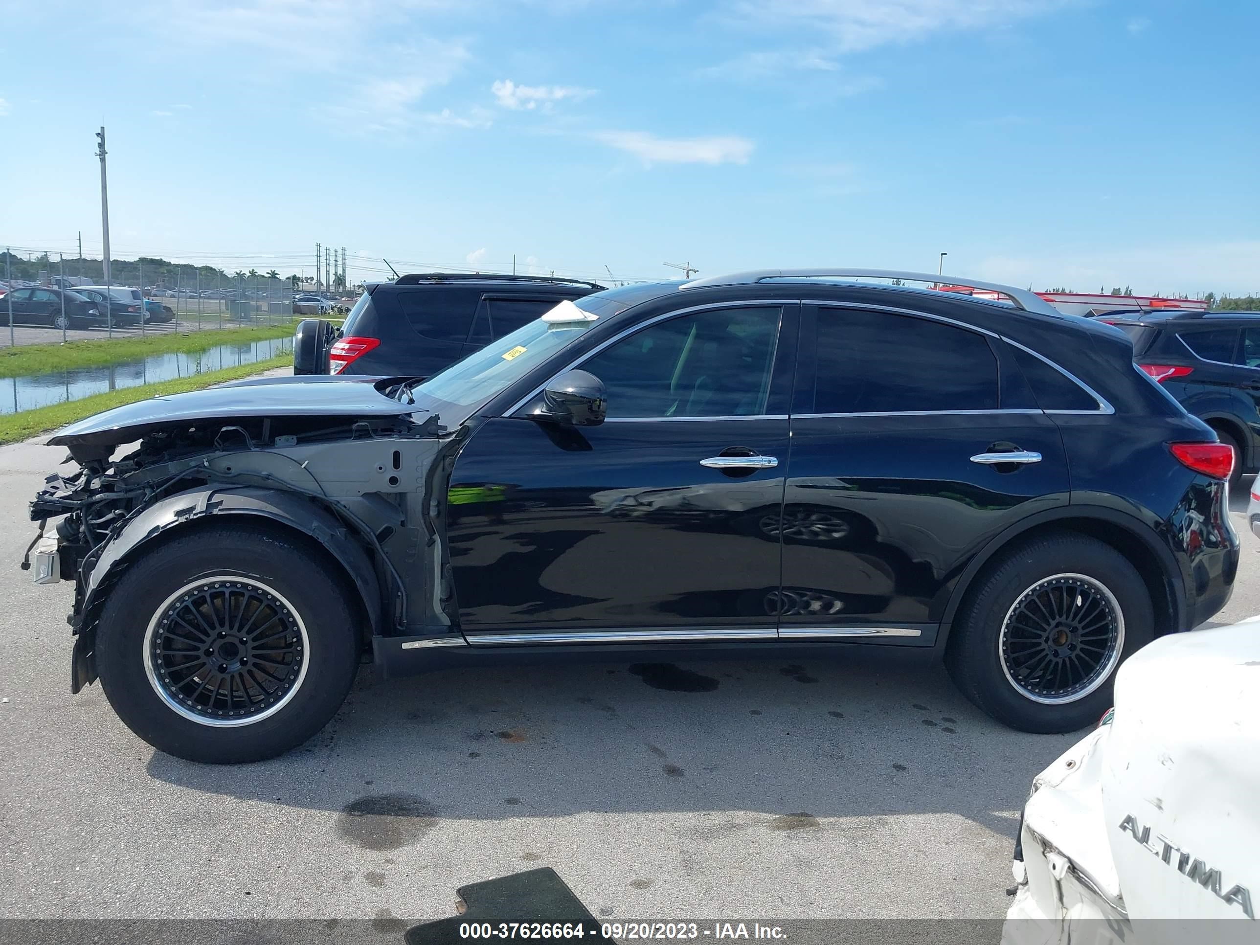 Photo 13 VIN: JN8CS1MU4EM450037 - INFINITI QX70 