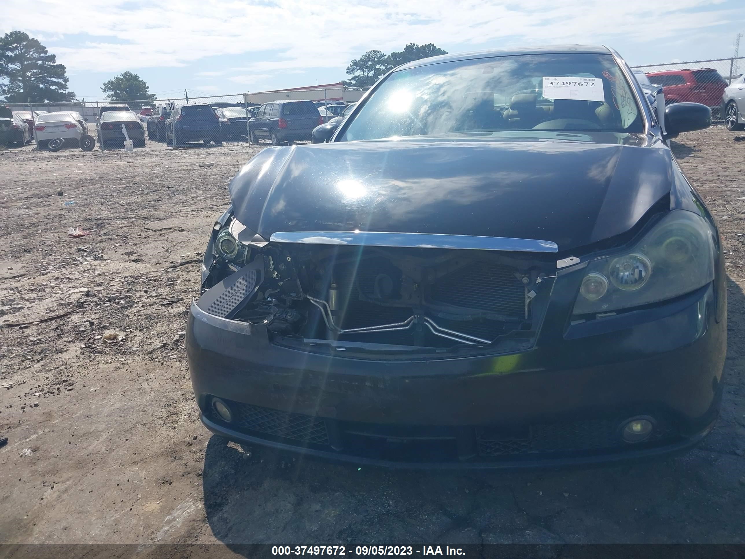 Photo 11 VIN: JNKAY01E16M106030 - INFINITI M 