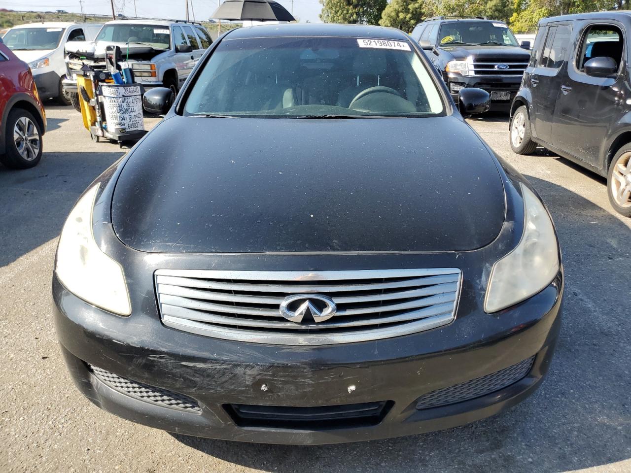 Photo 4 VIN: JNKBV61E27M706668 - INFINITI G 