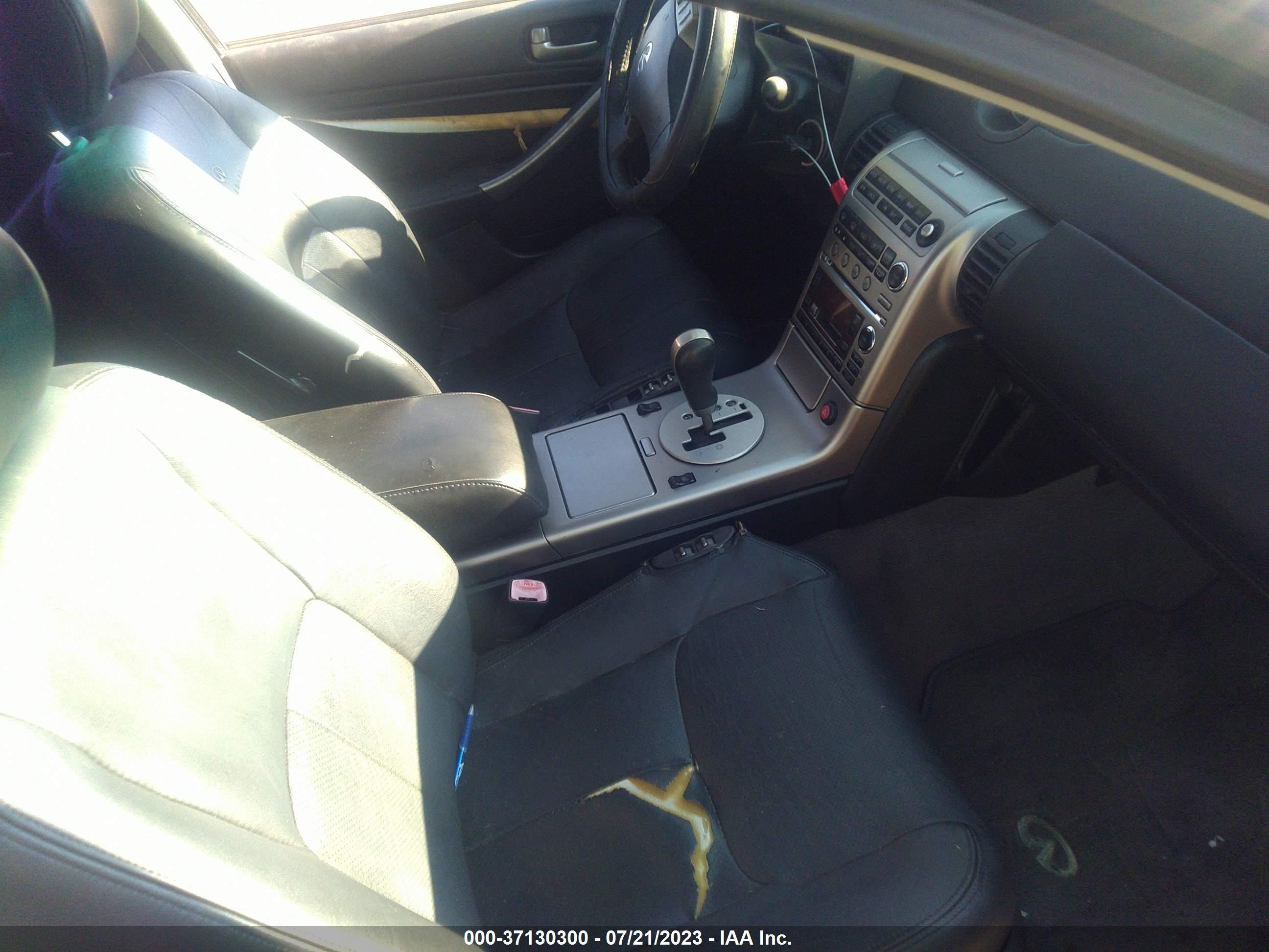 Photo 4 VIN: JNKCV51E14M105004 - INFINITI G 