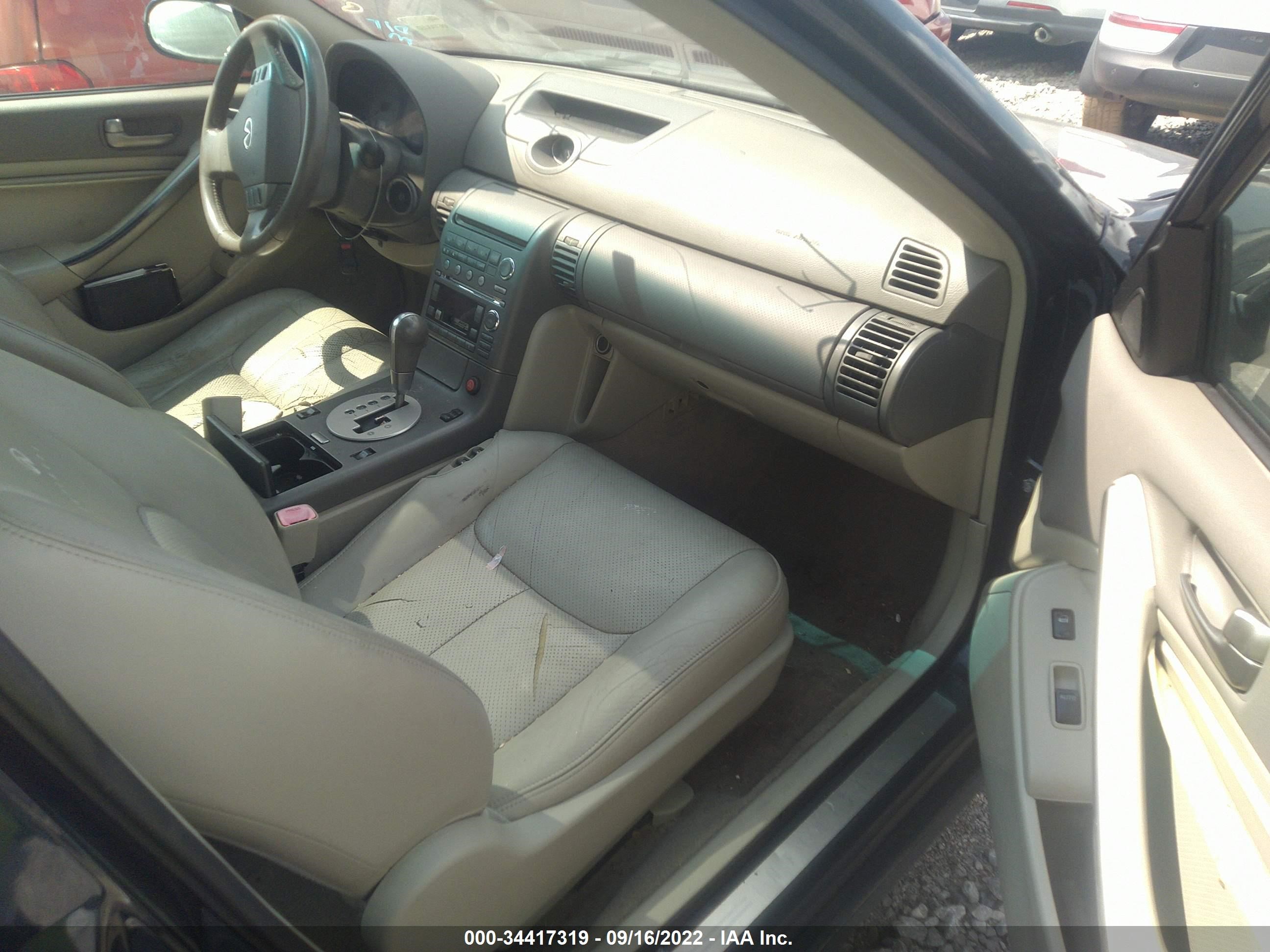 Photo 4 VIN: JNKCV51F54M704951 - INFINITI G 