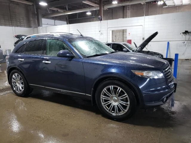 Photo 3 VIN: JNRBS08WX5X400478 - INFINITI FX45 