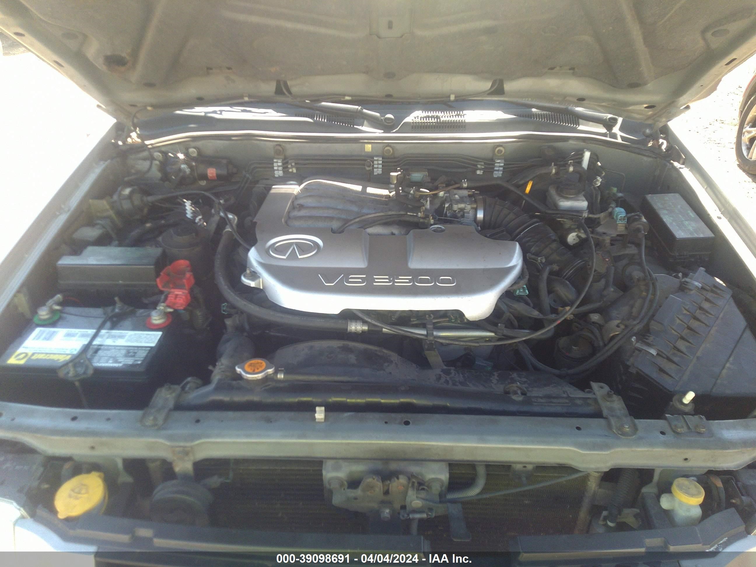 Photo 9 VIN: JNRDR09X11W202352 - INFINITI QX4 