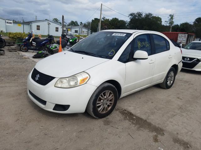 Photo 1 VIN: JS2YC5A20A6303159 - SUZUKI SX4 LE 