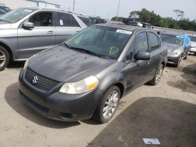 Photo 1 VIN: JS2YC5A20B6303888 - SUZUKI SX4 LE 