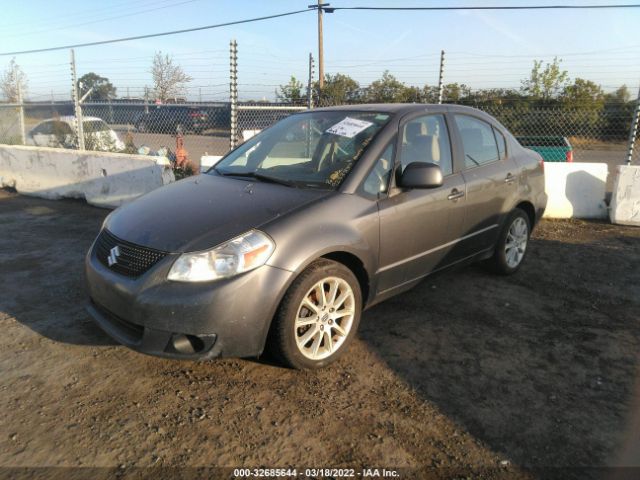 Photo 1 VIN: JS2YC5A20B6304913 - SUZUKI SX4 