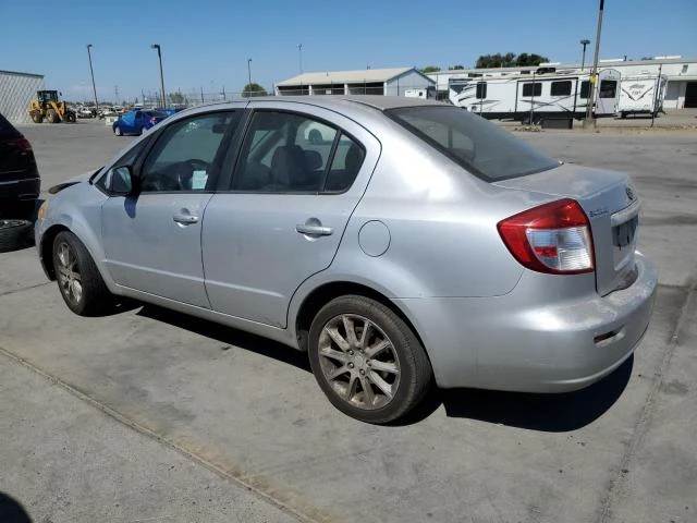 Photo 1 VIN: JS2YC5A22B6301642 - SUZUKI SX4 LE 