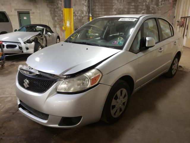 Photo 1 VIN: JS2YC5A24B6300850 - SUZUKI SX4 LE 