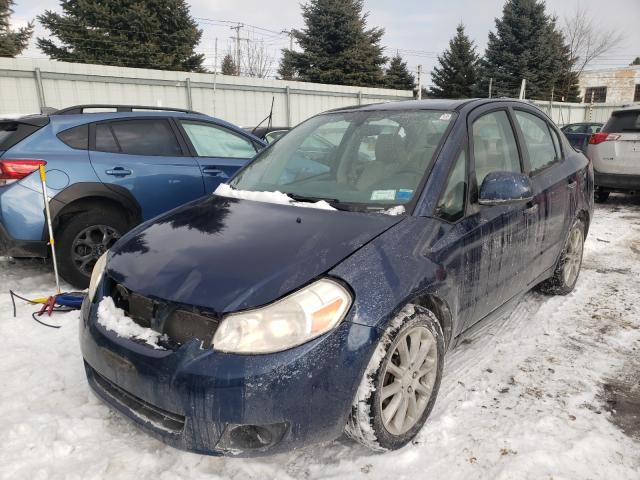 Photo 1 VIN: JS2YC5A2XB6300352 - SUZUKI SX4 LE 