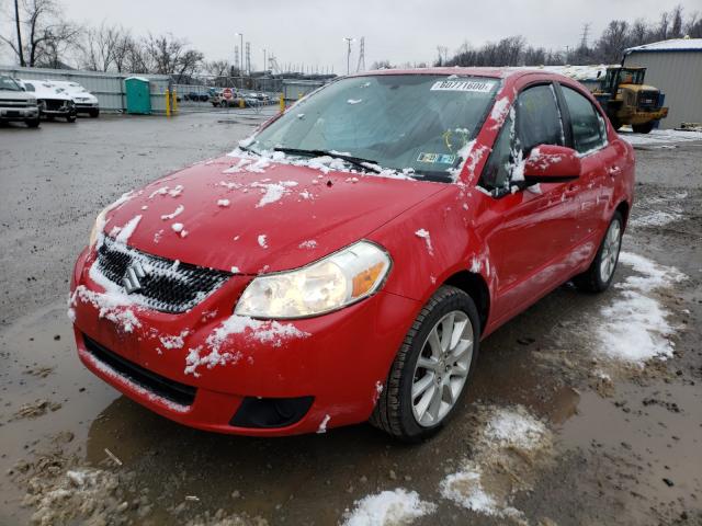 Photo 1 VIN: JS2YC5A2XB6304319 - SUZUKI SX4 LE 