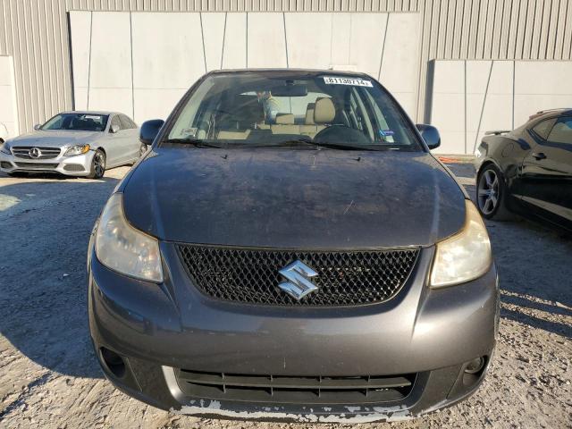 Photo 4 VIN: JS2YC5A2XB6304661 - SUZUKI SX4 LE 