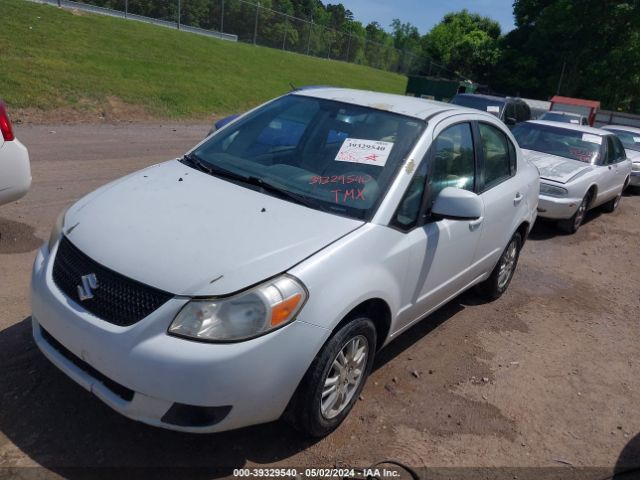 Photo 1 VIN: JS2YC5A30C6304694 - SUZUKI SX4 