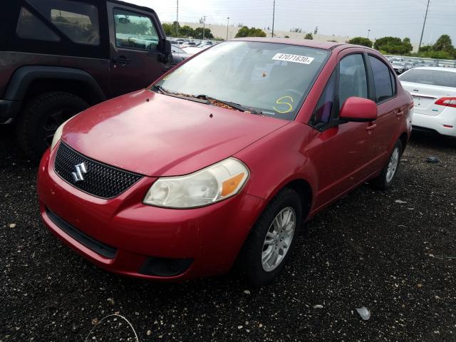 Photo 1 VIN: JS2YC5A30D6100205 - SUZUKI SX4 LE 