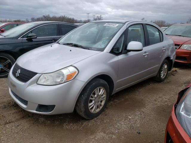 Photo 1 VIN: JS2YC5A31C6304672 - SUZUKI SX4 LE 