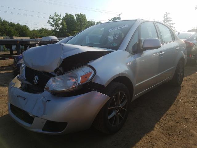 Photo 1 VIN: JS2YC5A33C6304544 - SUZUKI SX4 LE 