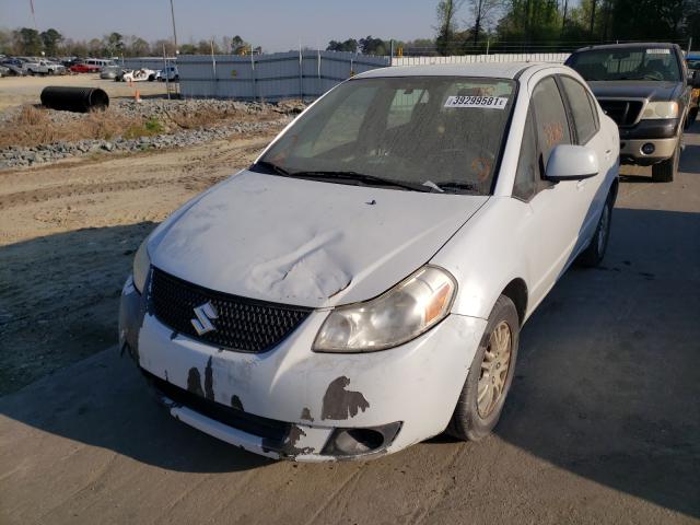 Photo 1 VIN: JS2YC5A36C6300813 - SUZUKI SX4 LE 