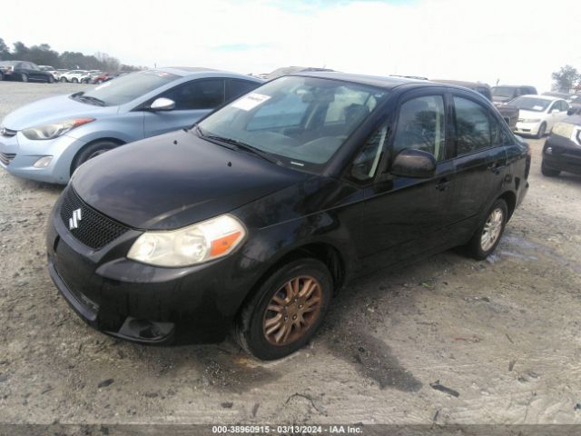 Photo 1 VIN: JS2YC5A38C6300974 - SUZUKI SX4 