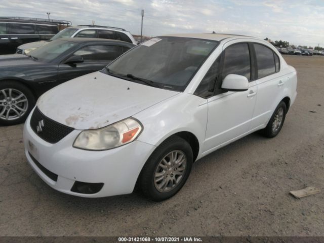 Photo 1 VIN: JS2YC5A39C6303365 - SUZUKI SX4 