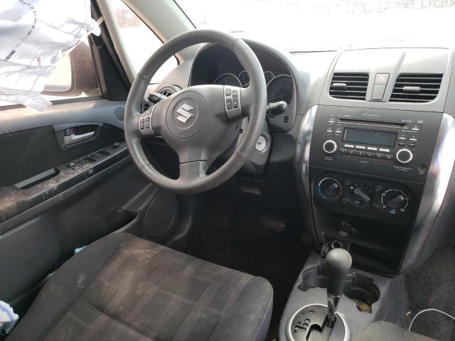 Photo 9 VIN: JS2YC5A39C6304094 - SUZUKI SX4 LE 