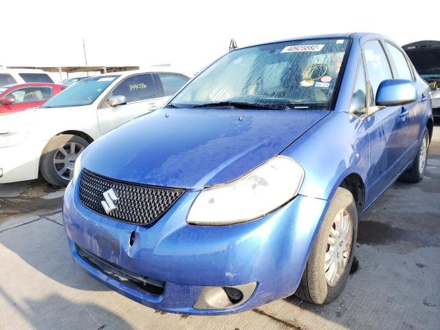 Photo 1 VIN: JS2YC5A3XC6302872 - SUZUKI SX4 LE 