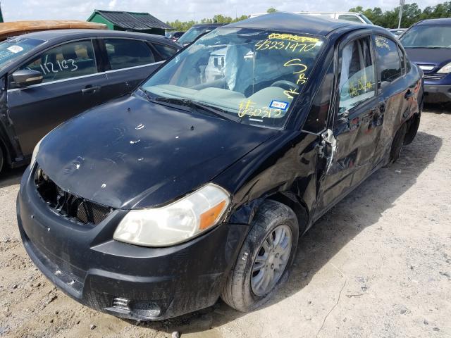 Photo 1 VIN: JS2YC5A3XC6304315 - SUZUKI SX4 LE 