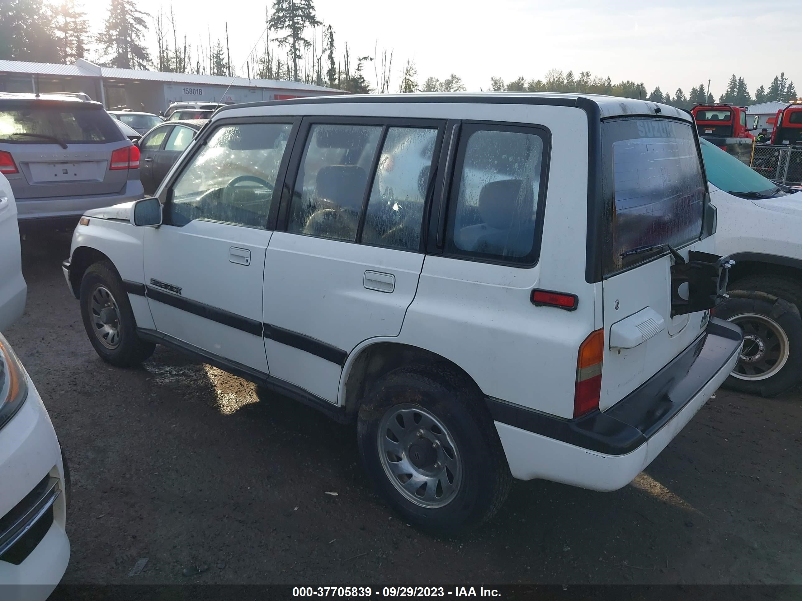 Photo 2 VIN: JS3TD02V3P4100995 - SUZUKI SIDEKICK 