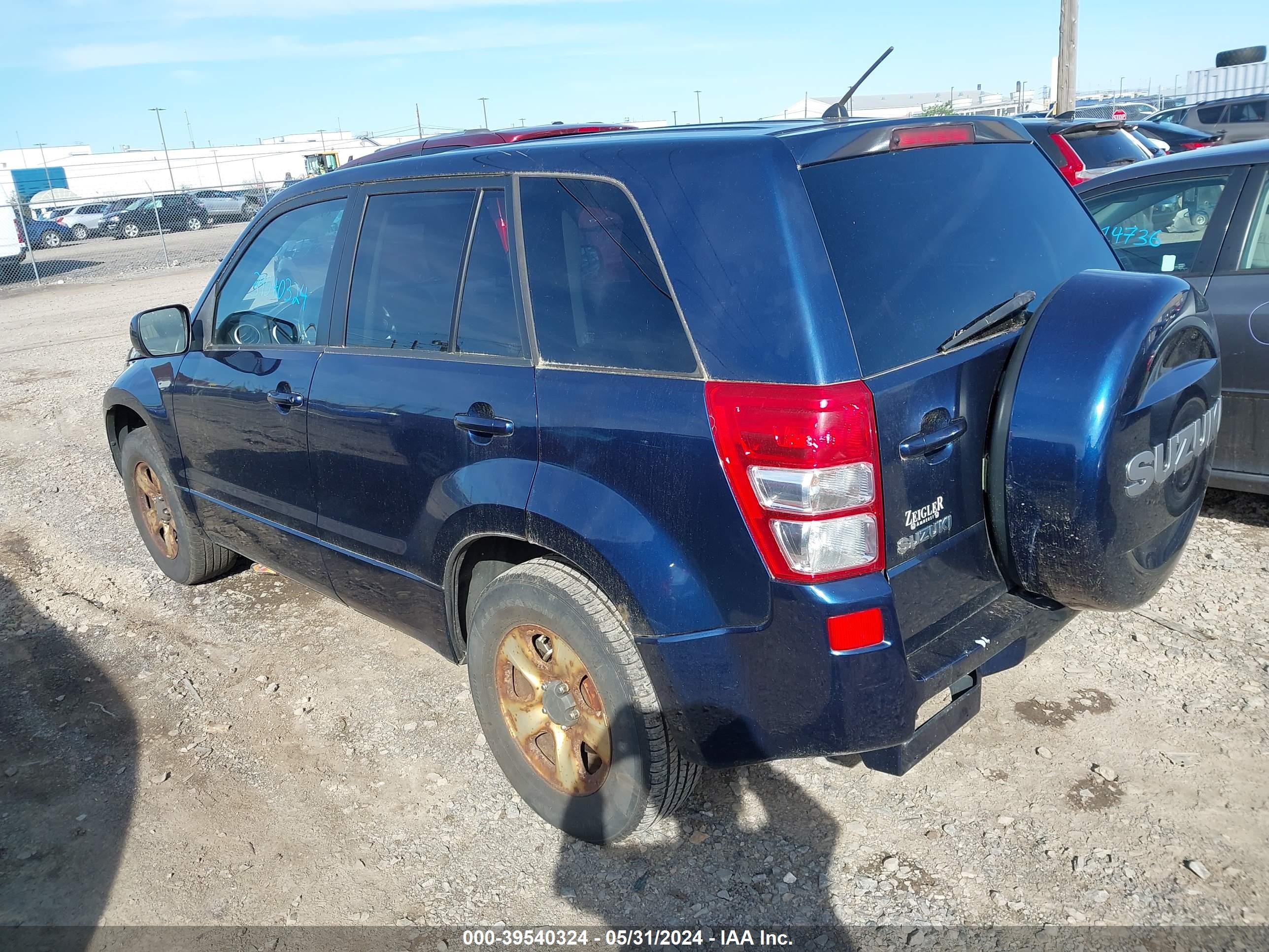 Photo 2 VIN: JS3TD0D28B4100051 - SUZUKI GRAND VITARA 