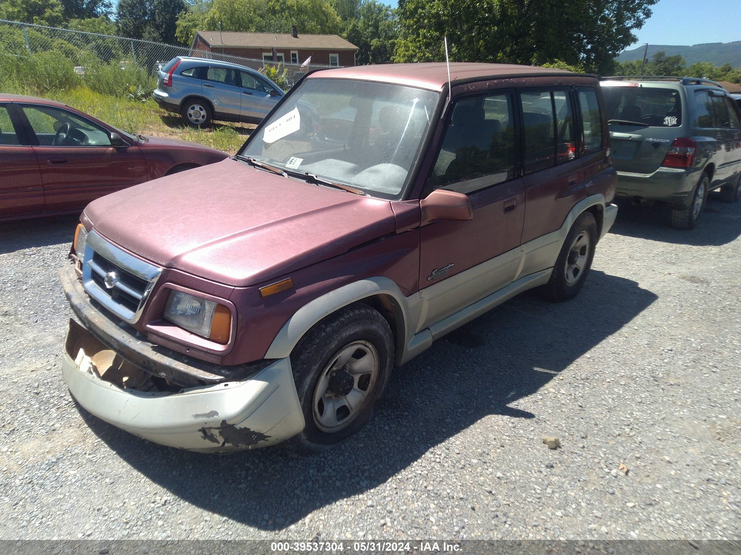 Photo 1 VIN: JS3TD21V7W4107475 - SUZUKI SIDEKICK 